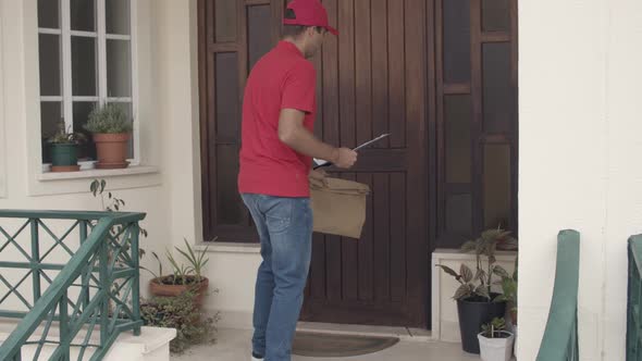 Courier Wearing Uniform, Leaving Paper Package