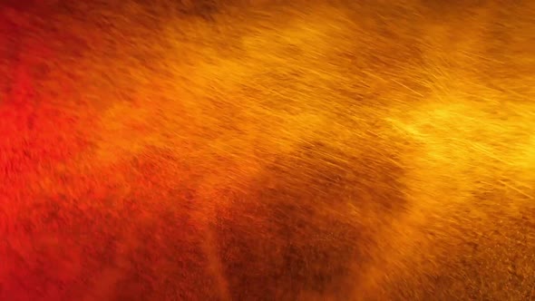 Red and Yellow Water Spray Mixed on a Black Background. Slow Motion alt