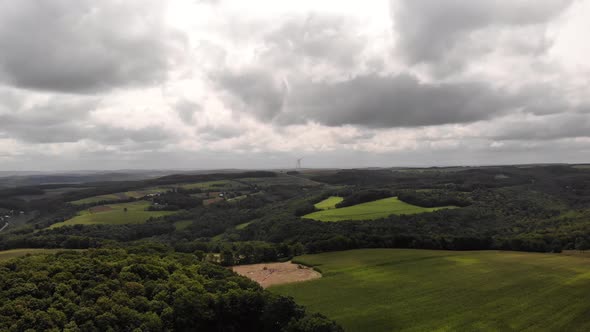 Slow aerial moving point of view of the landscape with the sky