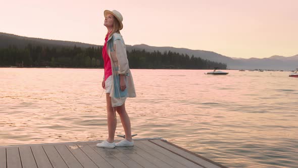 Cinematic Slow Motion Woman Looking at Sunset on World Famous Lake Tahoe