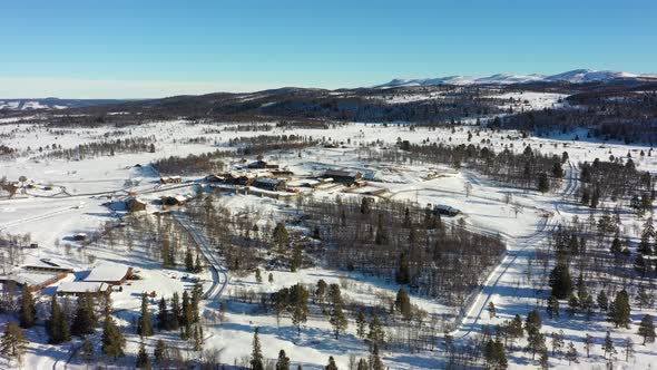 Langedrag nature park distant aerial overview during sunny winter morning - Rotating to left while k