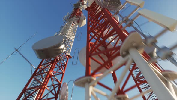 Antenna complex on a blue sky. Radio masts and towers for broadcasting. Loopable