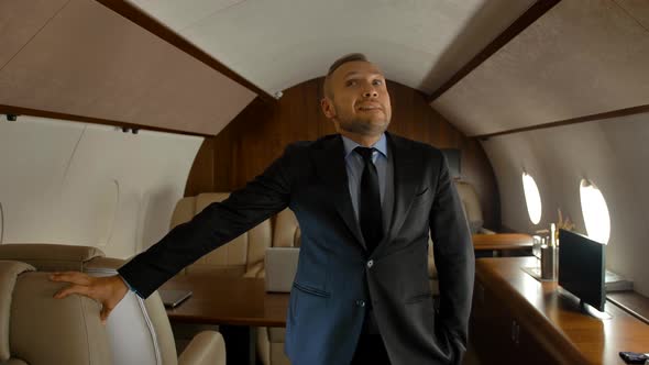 Businessman Flying on His Private Jet