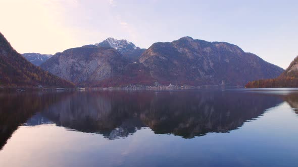 Flying Over the Lake Towards the Town of Hallstatt in Austria