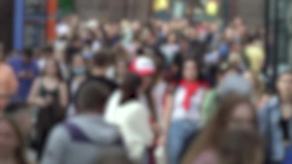 Silhouettes of People Walking in a Crowd Slow Motion