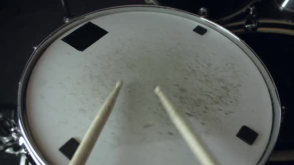 the Drummer Plays with Sticks on a Snare Drum Home Lesson Training