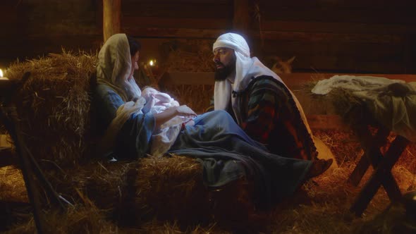 Joseph Speaking with Mary After Birth of Jesus