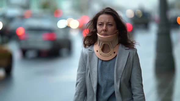 Woman with Chronic Neck Pain, Portrait of Unhappy Woman, Cervical Collar or Neck Brace for Curing