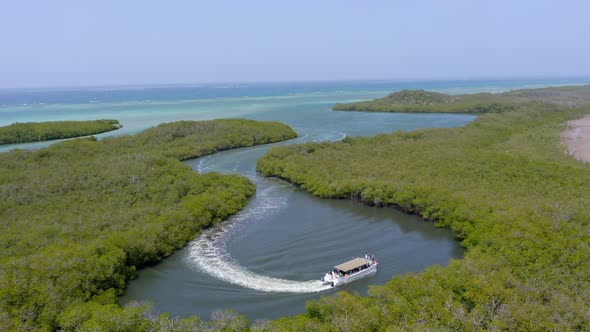 Tourist boat cruises in coastal mangroves of Monte Cristi National Park