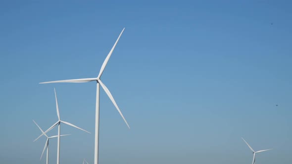 Wind station on a background of blue sky