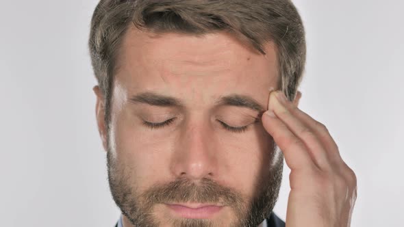 Close Up of Man Face Gesturing Headache, Stress