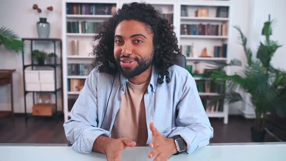 Professional Young Arabian Man Speaks Through Wireless Headset Screen View