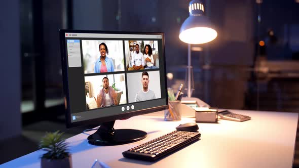 Video Chat Windows on Computer at Night Office