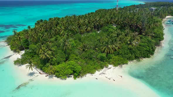 Natural overhead clean view of a sunshine white sandy paradise beach and aqua blue ocean background 