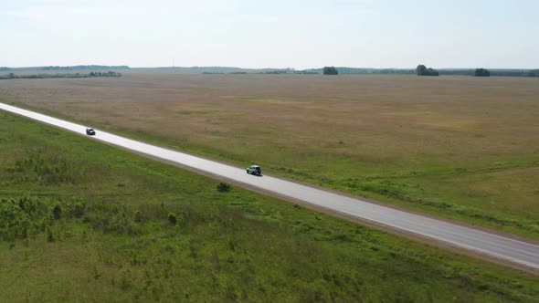 Aerial View of a Traveler's Car on the Road