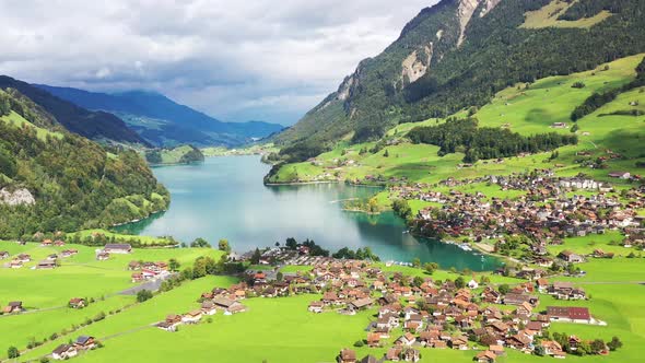 Lungern, Switzerland. Aerial view of the mountain valley and village. The lake among the mountains.