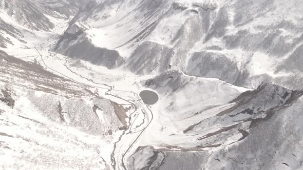 Gudauri, Georgia - April 12, 2021: Aerial view of Russia–Georgia Friendship Monument