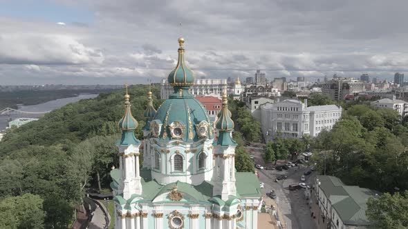 The Architecture of Kyiv. Ukraine. St. Andrew's Church. Aerial. Slow Motion, Gray, Flat