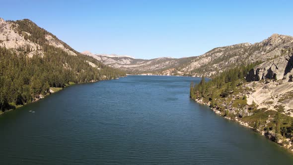 Drone flying above the water of Lower Echo Lake, Tahoe. USA