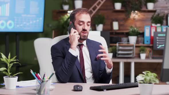 Slow Motion Shot of Angry Businessman Yelling on the Phone