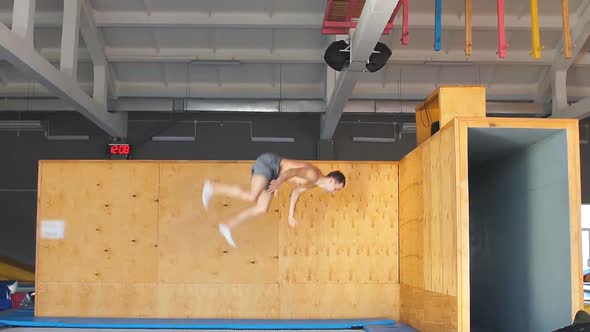 Young Ambitious Sportsman Is Going To Do a Stunt at Trampoline