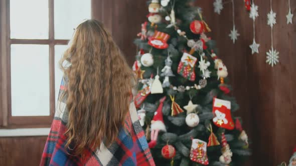 Girl Near Christmas Tree