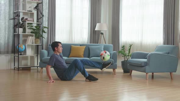 Asian Man Show Skill With Soccer Ball In Living Room, Soccer Freestyle