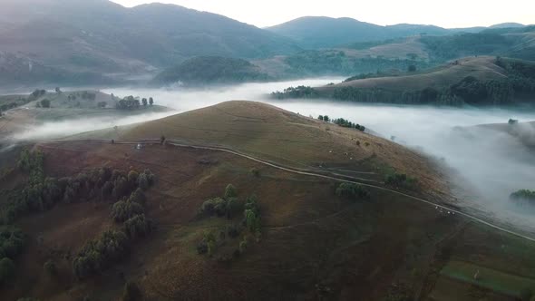 Aerial View Of Foggy Morning In Mountains