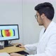 Eye doctor performing corneal topography exam. 4K - VideoHive Item for Sale