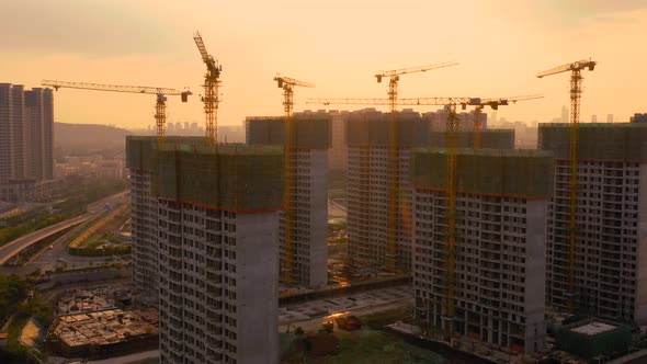 Aerial of construction site at sunset