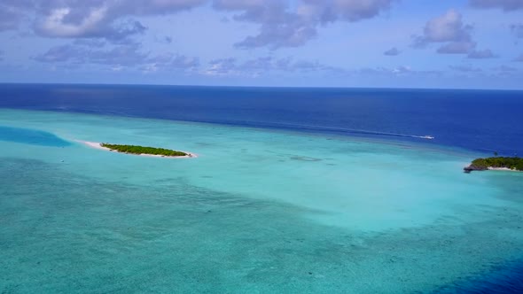 Aerial scenery of coastline beach by lagoon and sand background