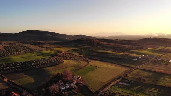 Flying Over the Amazing Rolling Hills of Tuscany Italy at Sunset