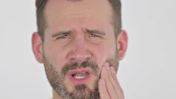 Close Up of Face of Middle Aged Man with Toothache