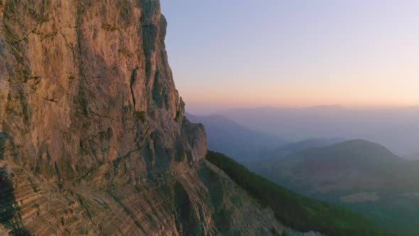South Tyrol Plose Peitlerkofel golden hour steep mountain slope aerial view looking out to spectacul