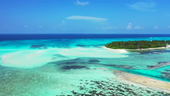 Wide overhead abstract view of a white sandy paradise beach and aqua blue water background in vibran