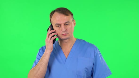 Medical Man Talking for Mobile Phone. Green Screen