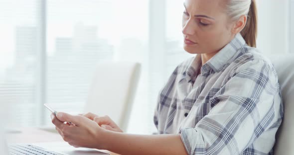 Businesswoman working on laptop