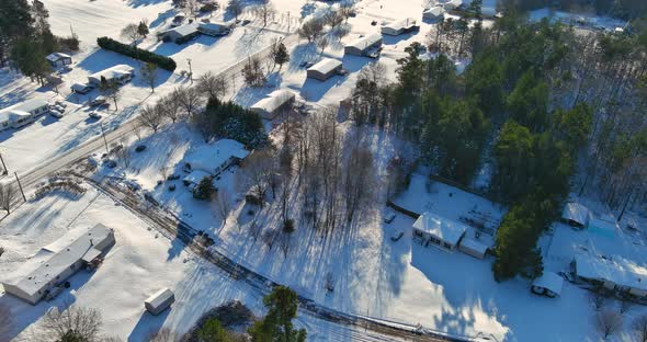 Aerial View Snow Covered Roofs of Houses a Winter Day