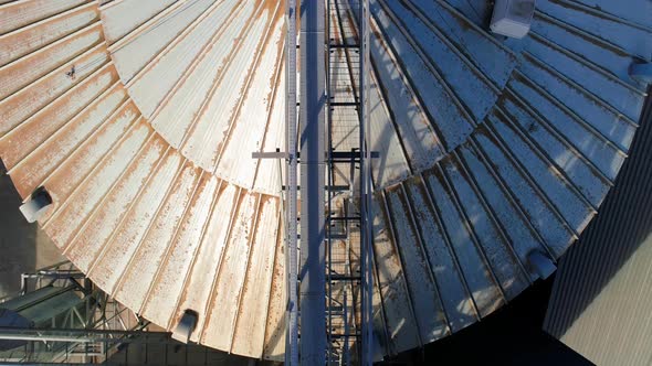 Farming elevator and granary. Storage of grain and other different cereals. Aerial view