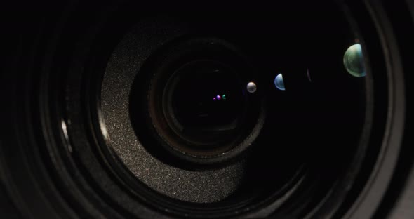 Closeup of Lens Lens Illuminated By a Thin Beam of Light