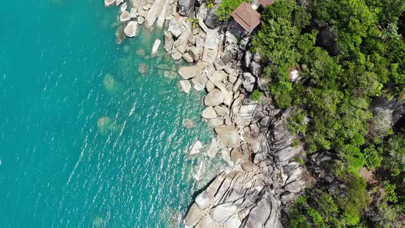 Small Houses on Tropical Island. Tiny Cozy Bungalows Located on Shore of Koh Samui Island Near Calm