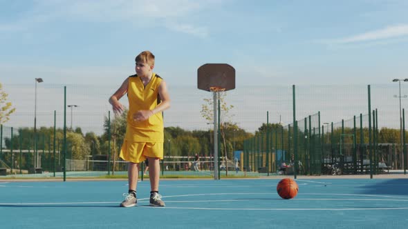 Young boy doing gymnastics outdoors