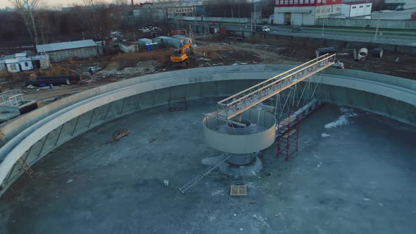 Round Basin for Dirty Water with Ground at Construction Site