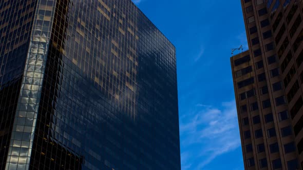 Clouds rolling by a skyscraper in Downtown Colorado -time lapse