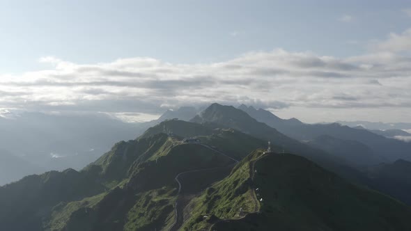 Aerial View Mountain Ridge Panorama Flight Surrounded By Cloudy Weather Sunrise Organic Environment