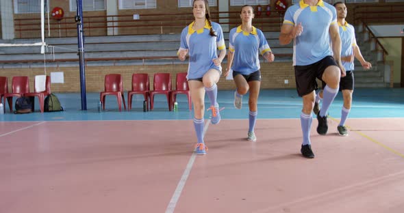 Volleyball players exercising in the court 4k