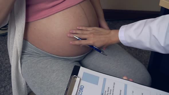 Pregnant Woman and Gynecologist Doctor at Hospital