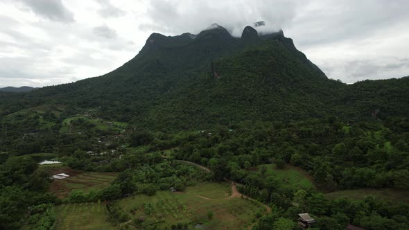 Aerial view of the village in valley, Chiang Dao mountain, Thailand by drone