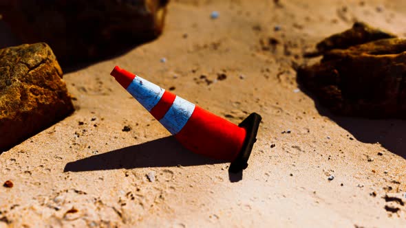 Traffic Safety Cone at Empty Sand Beach