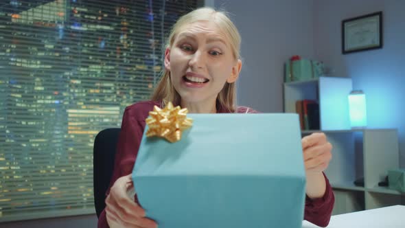 Excited Young Woman Announcing the Winner and Presenting the Prize Live